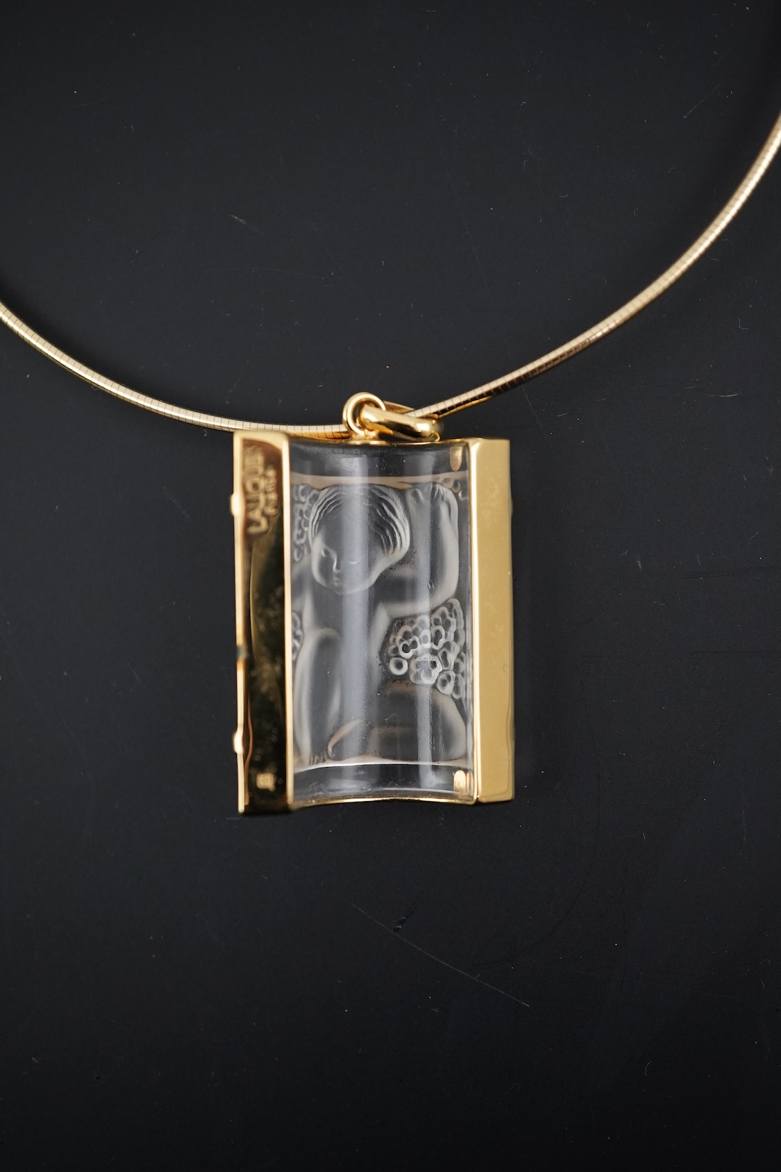 A Lalique Enfants pendant necklace, cased